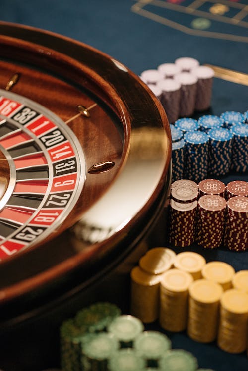 casino chips and roulette wheel